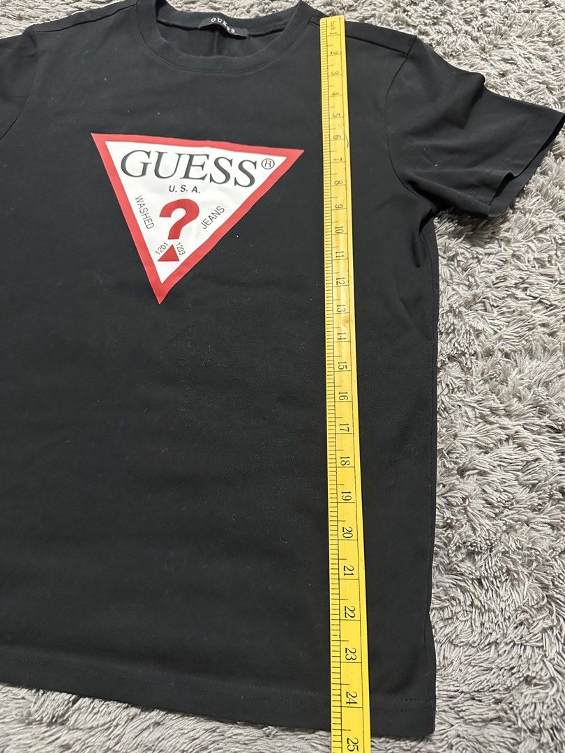 Guess T Shirt Original (Category: Others Tops) located in Manila. Submitted by mae__________c (Listing ID 1463684846, Image 2). Description: small.