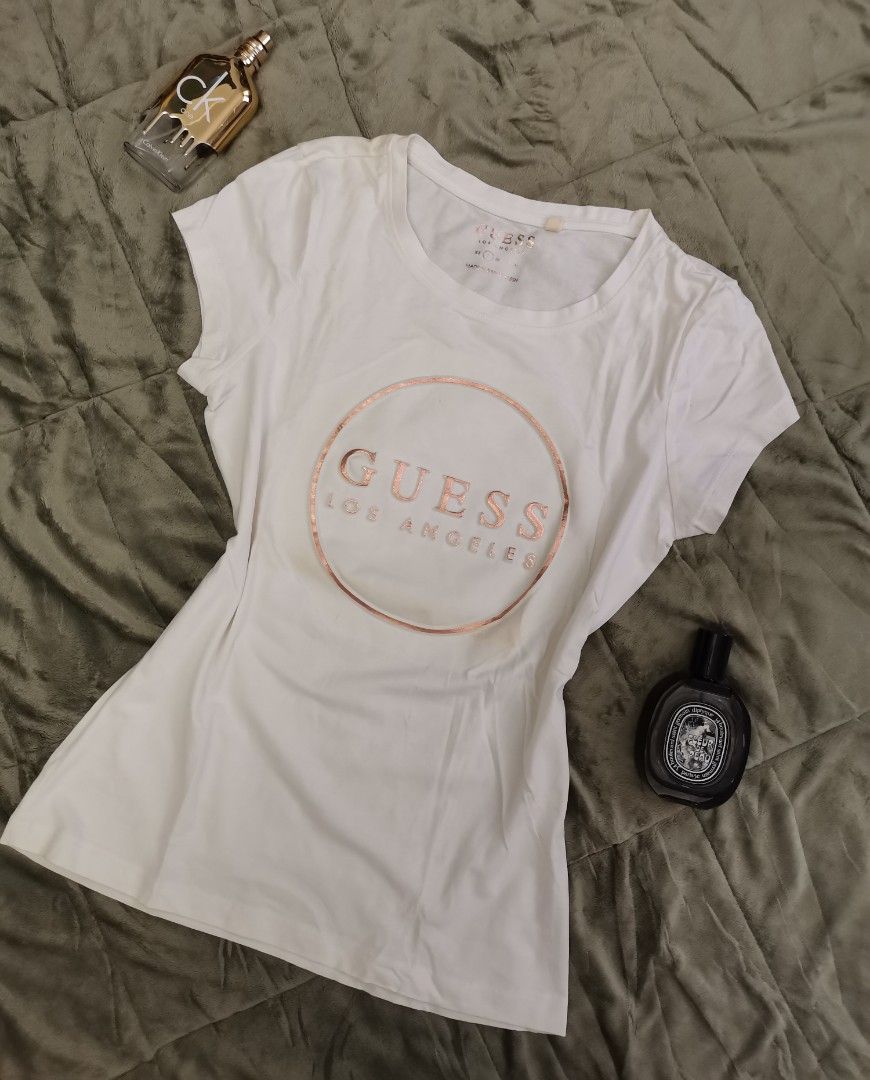 Guess tshirt (Category: Shirts) located in Quezon City. Submitted by closetnikikay (Listing ID 1463691186, Image 1). Description: .