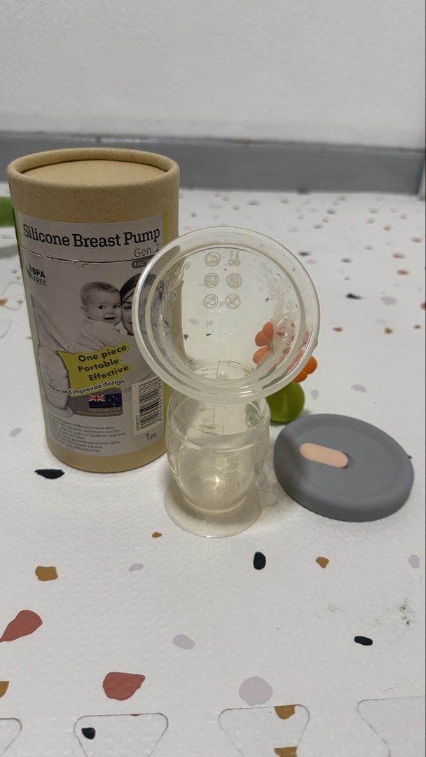 Haakaa Silicone Breast Pump Gen. 2 with Lids (Category: Breastfeeding & Bottle Feeding) located in Santa Cruz. Submitted by jlchua (Listing ID 1463668647, Image 1). Description: - Haakaa Silicone Breast Pump Gen. 2 - Capacity: 4 oz / 100ml - One-piece, portable design - Made from BPA-free silicone - Silent operation, no cords or batteries required - Suction base to prevent accidental spills - New and improved design - Comes with a flower-shaped s