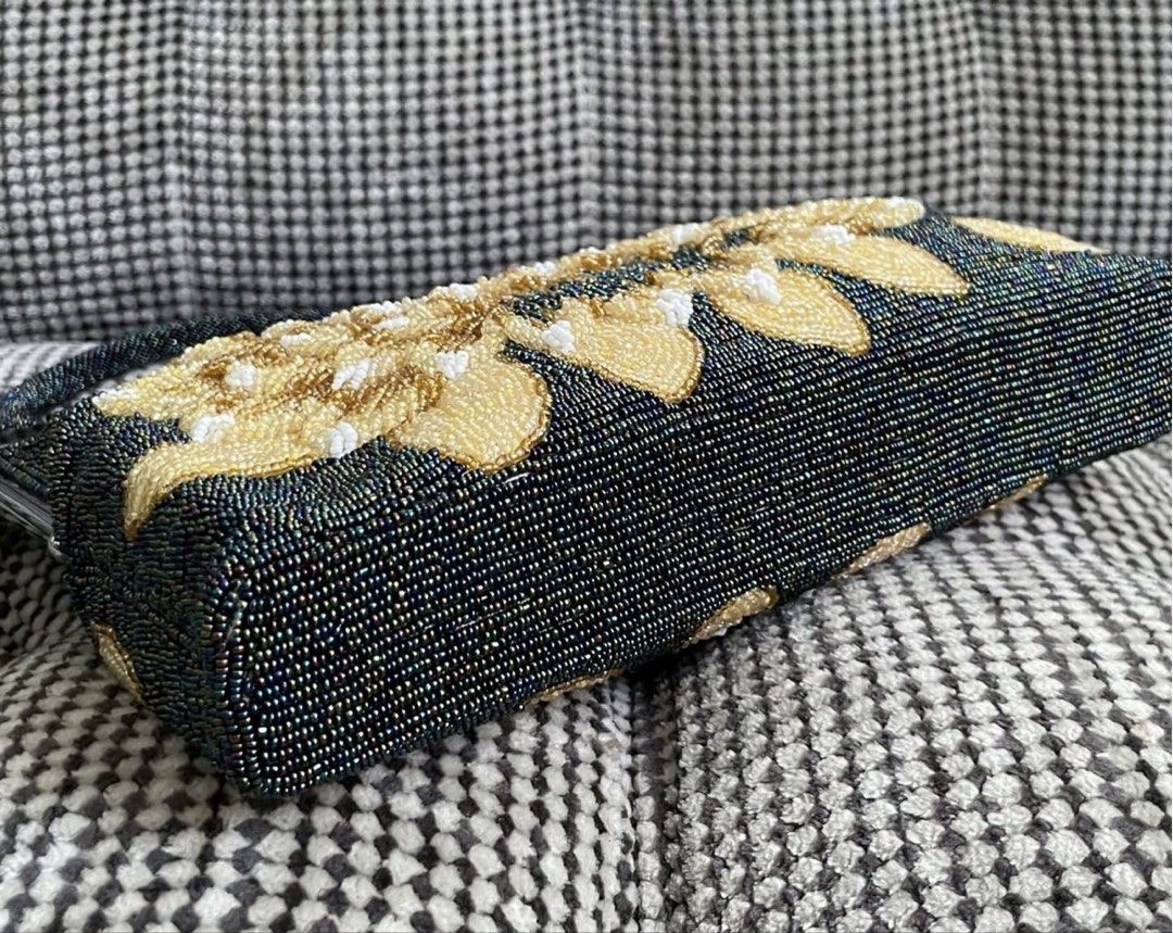 Handcrafted beaded clutch (Category: Clutches) located in Bulacan. Submitted by thriftbagcollections (Listing ID 1463678971, Image 3). Description: Handcrafted beaded clutch,excellent condition!Approx:H-6” W-8”D-1.3” handle 5.3” .
