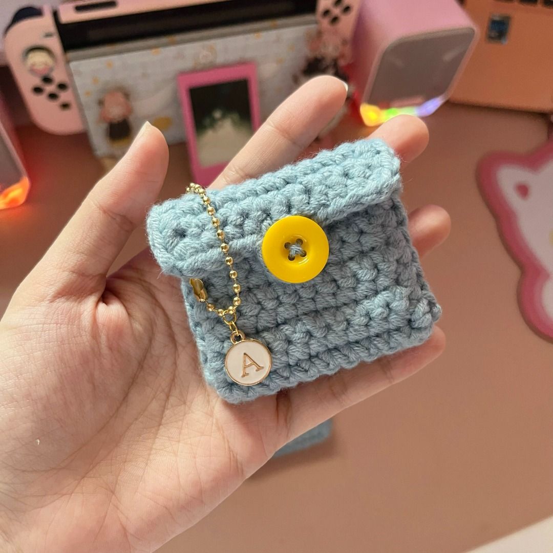 Handmade Crochet Mini Coin Purse with Button (Category: Purses & Pouches) located in Mandaluyong City. Submitted by bbkc.ph (Listing ID 1463645688, Image 2). Description: 🌸 Kawaii handmade crochet mini coin purse 🌸 Can be used as bag charm 🌸Secure button closure 🌸 Includes a personalized initial charm 🌸 Send a message for specific color/letter pendant request 🌸 Ideal for gifting or treating yourself 🌸 Quantity: 1pc 🌸 This product includes