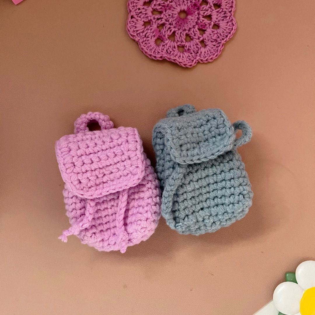 Handmade Crochet Mini Backpack Coin Purse (Category: Handmade Craft) located in Mandaluyong City. Submitted by bbkc.ph (Listing ID 1463643240, Image 2). Description: 🌸 Handmade crocheted backpack coin purse 🌸 Ideal as a keychain or bag charm 🌸 Snap button lock 🌸 Send a message for color request 🌸 Quantity: 1pc 🌸 This product has no cardboard packaging 🌸 Pictures posted are photos of the actual product 🌸 Please allow slight difference in c