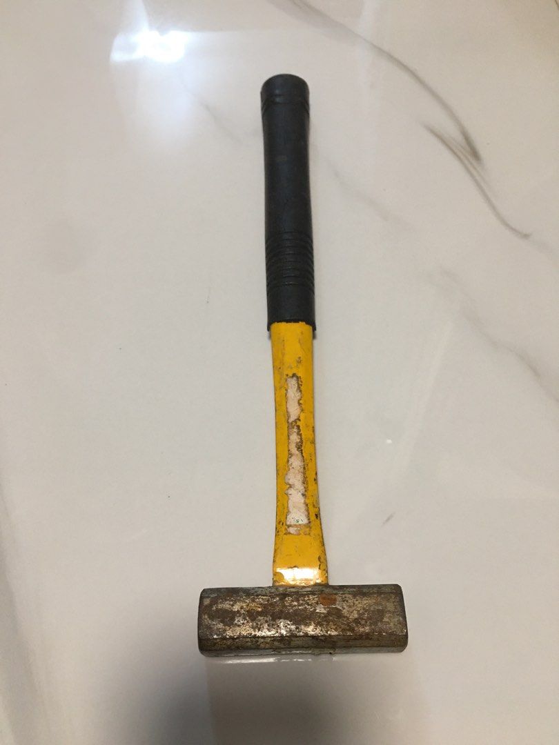 Heavy Duty Sledgehammer with Rubber Grip Handle (Category: Construction Tools & Equipment) located in Pasay City. Submitted by gilbertso62551 (Listing ID 1463665683, Image 1). Description: - Solid metal hammer with a durable yellow painted handle. - Features a black rubber grip for enhanced handling and control. - Still highly functional and reliable for heavy-duty tasks. - Measurements are clearly shown in the product photos. - Ideal tool for co