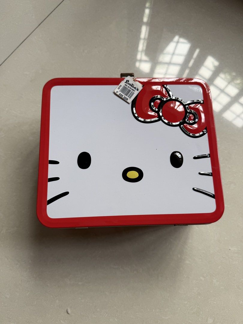 Hello Kitty Authentic Lunch Box Tin (Category: Food Organization & Storage) located in Makati City. Submitted by dflim (Listing ID 1463637427, Image 2). Description: Brand New Authentic Hello Kitty Tin Lunchbox In very good condition; brand new with tag Authentic licensed Hello Kitty item Php 650 (sells for Php 895 in Rustan’s) Shipping c/o buyer Rfs decluttering.