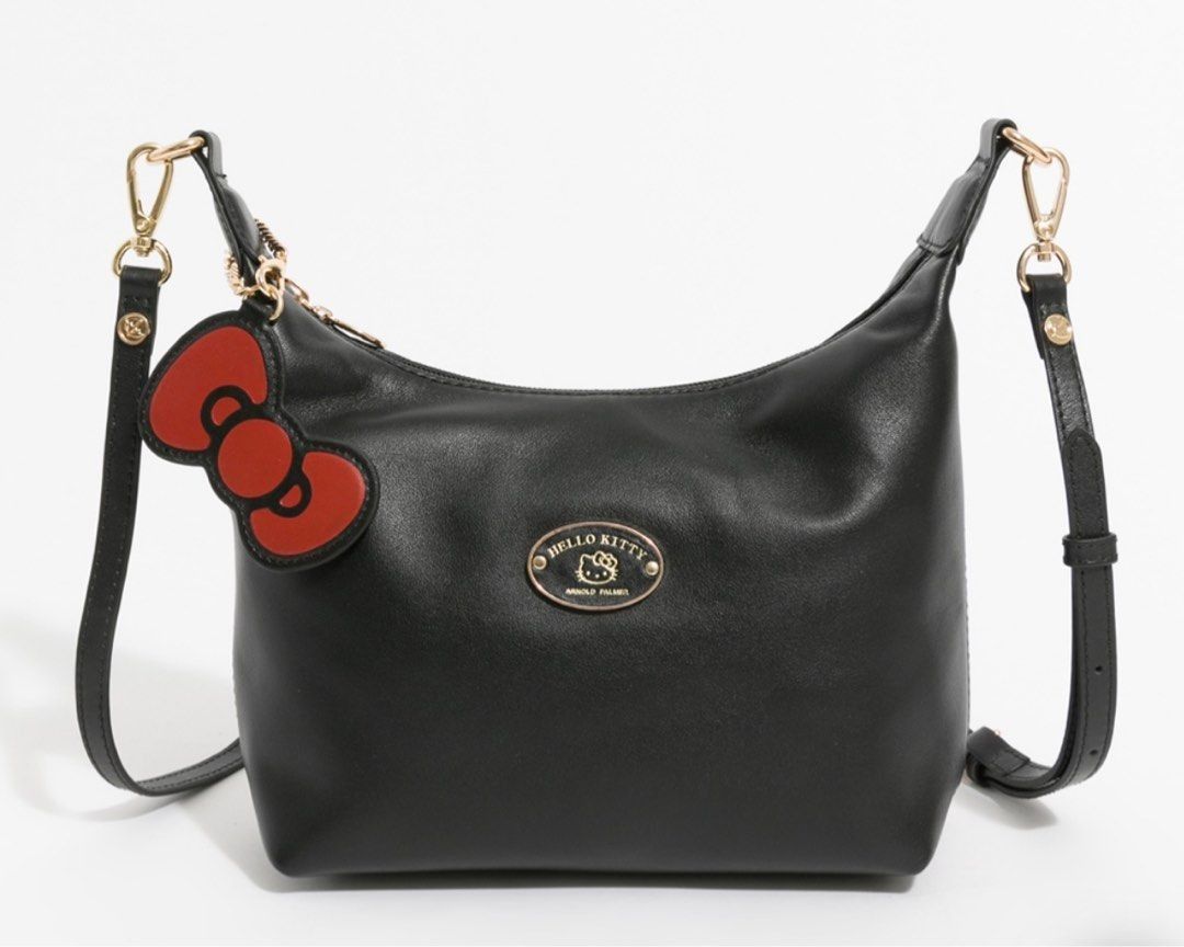 Hello Kitty x Arnold Palmer Hand / Shoulder Bag (Category: Cross-body Bags) located in Quezon City. Submitted by beckyshop2024 (Listing ID 1463655019, Image 2). Description: - Brand new with tag - Original from Taiwan - Hello Kitty collaboration with Arnold Palmer.