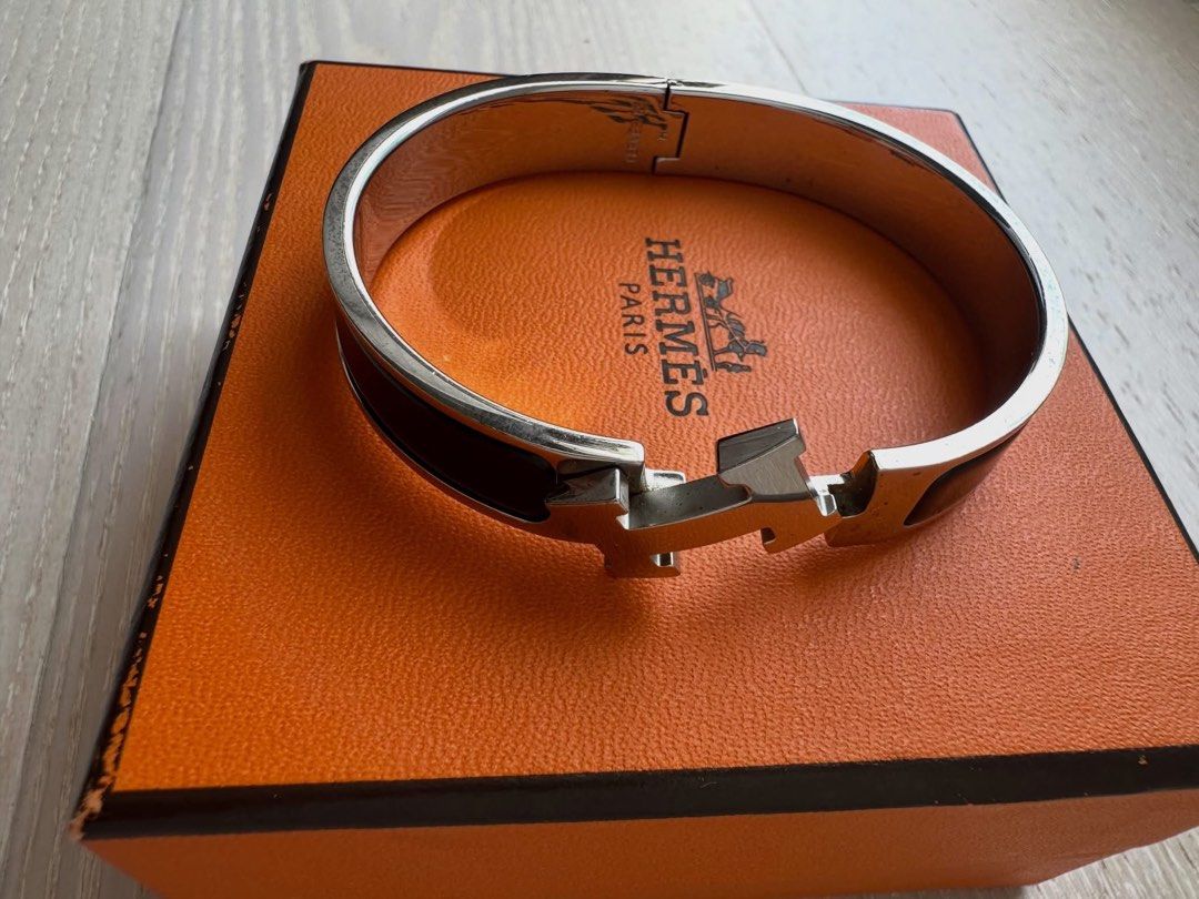 Hermes Hapi Bracelet Bangle Silver Black (Category: Bracelets) located in Cainta. Submitted by kairus.luckyfind (Listing ID 1463676952, Image 1). Description: - Authentic Hermes Hapi bracelet - (Wrist size: 17 cm | Width: 12 mm) - Preloved in Great Condition, Light Hairline Scratches which is unavoidable. - Comes with Box Only. - Bought it for ₱44k .