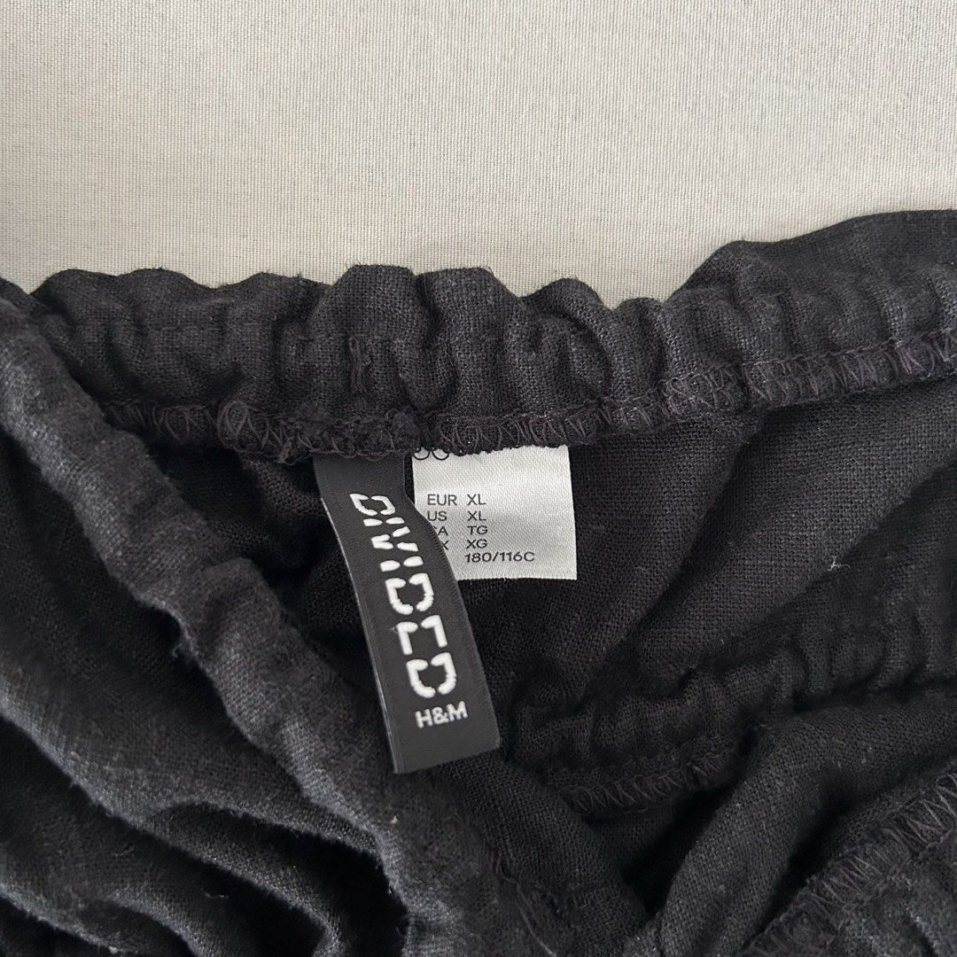 H&M BLACK LINEN TIE TOP (Category: Sleeveless) located in Manila. Submitted by thechicacueva (Listing ID 1463610868, Image 2). Description: h&m divided rlly nice linen material worn once! see last pic for ww pic (same top, diff color) 📍taft, manila city 💸 gcash / maribank 📦 lbc / j&t / lalamove (SDD).
