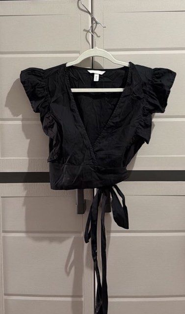 H&M Black Wrap Top with Flutter Sleeves (Category: Blouses) located in Imus. Submitted by ann.declutters22 (Listing ID 1463596041, Image 1). Description: - havent used this top 🥲 - size medium but can fit small - medium frame .