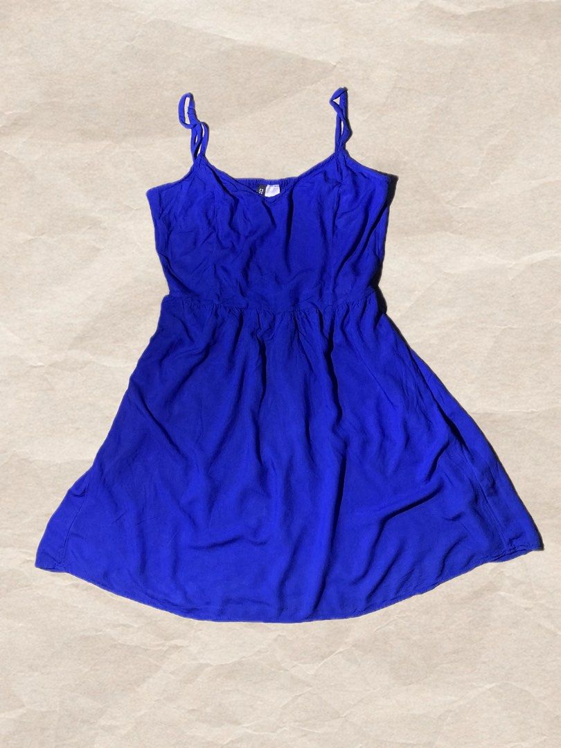 H&M Divided Blue Spaghetti Strap Mini Dress (Category: Dresses) located in Rizal. Submitted by pcesspscl145 (Listing ID 1463664330, Image 1). Description: - Cute blue mini dress from H&M - Features spaghetti straps - Elasticated waist for a comfortable fit - Flattering A-line skirt - Versatile for casual outings or layering.