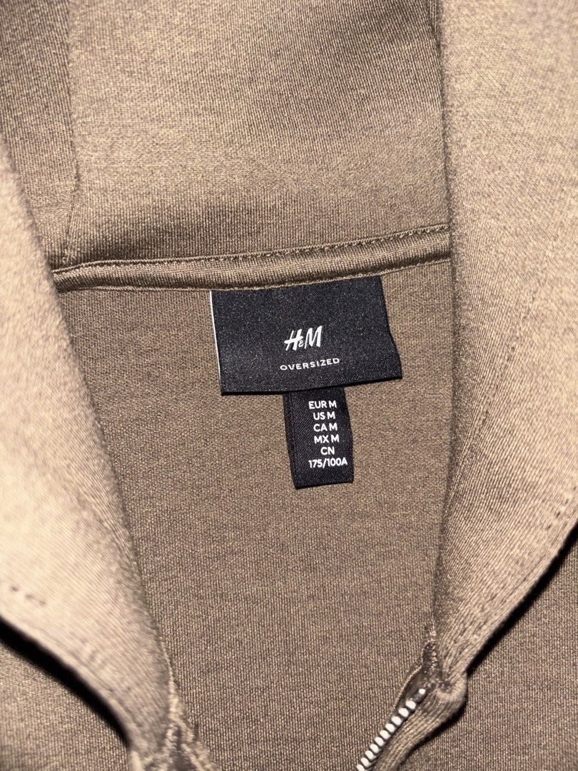 H&M Oversized Zip-Up Hoodie (Category: Hoodies) located in Binan City. Submitted by fashion_claims (Listing ID 1463662394, Image 3). Description: - Oversized zip-up hoodie from H&M - Neutral brown color - Front zipper closure - Two front pockets - Comfortable and casual design - Ideal for layering - Size: Medium (M).