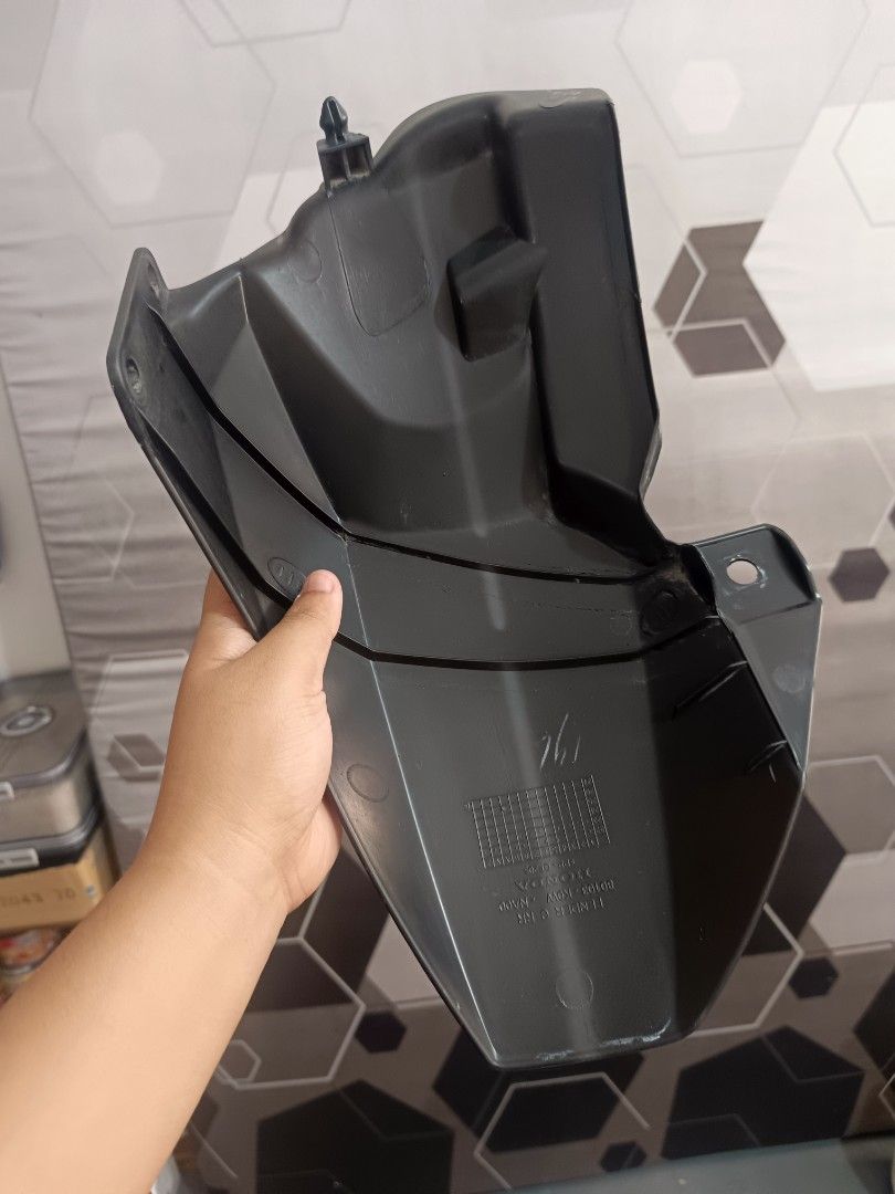 Honda Adv Front Fender Mudguard (Category: Body Parts and Accessories) located in General Trias. Submitted by qwerty2015 (Listing ID 1463688245, Image 2). Description: - Black front fender for motorcycle - Made of plastic - Features mounting holes for easy installation - Selling as is.