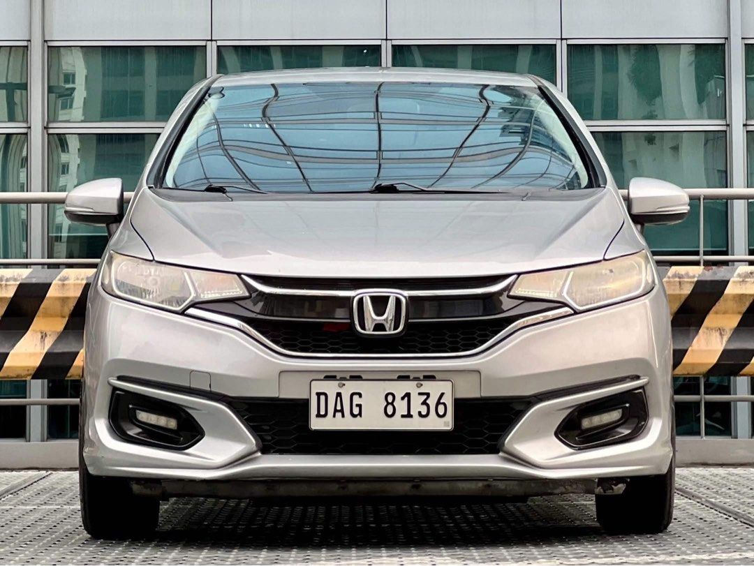 Honda Jazz Navi‼️🔥 Auto (Category: Used Cars) located in Makati City. Submitted by maby_latido05 (Listing ID 1463703678, Image 1). Description: 2018 Honda Jazz XV Navi 1.5 Gas AT‼️🔥 30%DP - 131,000 Php 2yrs - Php 29,000 3yrs - Php 21,000 4yrs - Php 17,000 Chattel and Insurance Included 💯FREE Transfer of Ownership 💯FREE Detailing 💯FREE Bank Processing 💯 Legit Mileage ✅ No Mileage Tampering Guaranteed! ✅ Free OBD Scanning! Push Start Automati