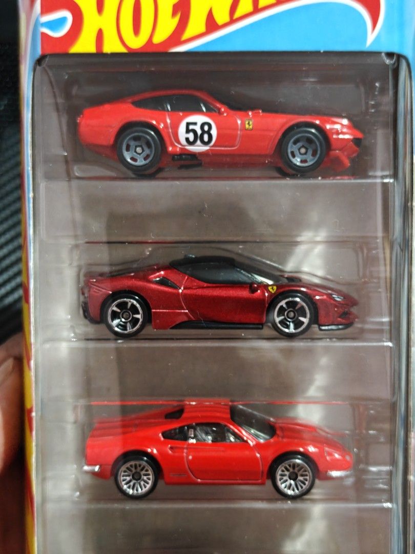 Hot Wheels five pack Ferrari Set RED (Category: Vehicle & Diecast Models) located in Mandaluyong City. Submitted by OttO.Moto (Listing ID 1463663259, Image 2). Description: **READ DETAILS** **PASS SA LP** **PRICES ARE FIRM** **PASS SA KWENTO** 1/64 Diecast Regular cars Card in MINT CONDITION Location Mandaluyong PAYMAYA payment Shipping at buyer's expense Thank you for looking.