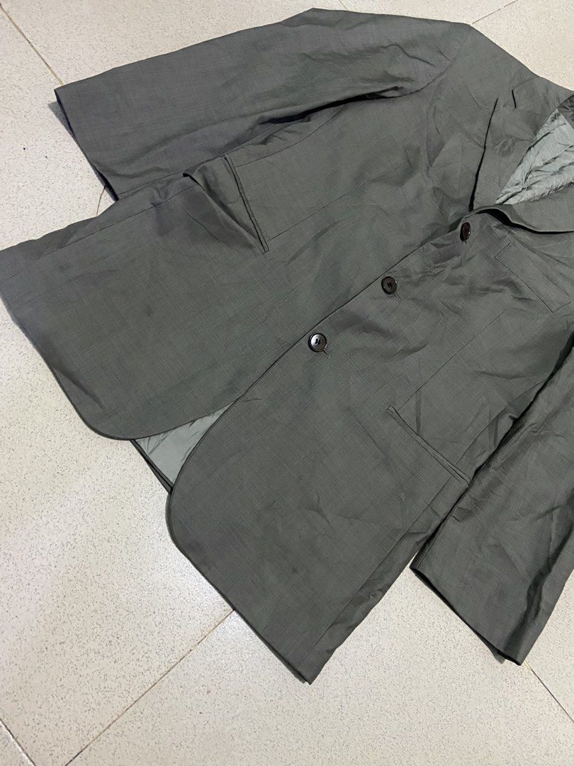 HUGO BOSS FINEST QUALITY BLAZER (Category: Coats, Jackets and Outerwear) located in Bulacan. Submitted by rrthrifts (Listing ID 1463654433, Image 3). Description: Hugo Boss grey wool three-button suit jacket / blazer. It features standard notched lapels, a single-breasted front with a classic three-button closure, flap waist pockets, and a clean structured drape typical of the brand’s tailoring lines..