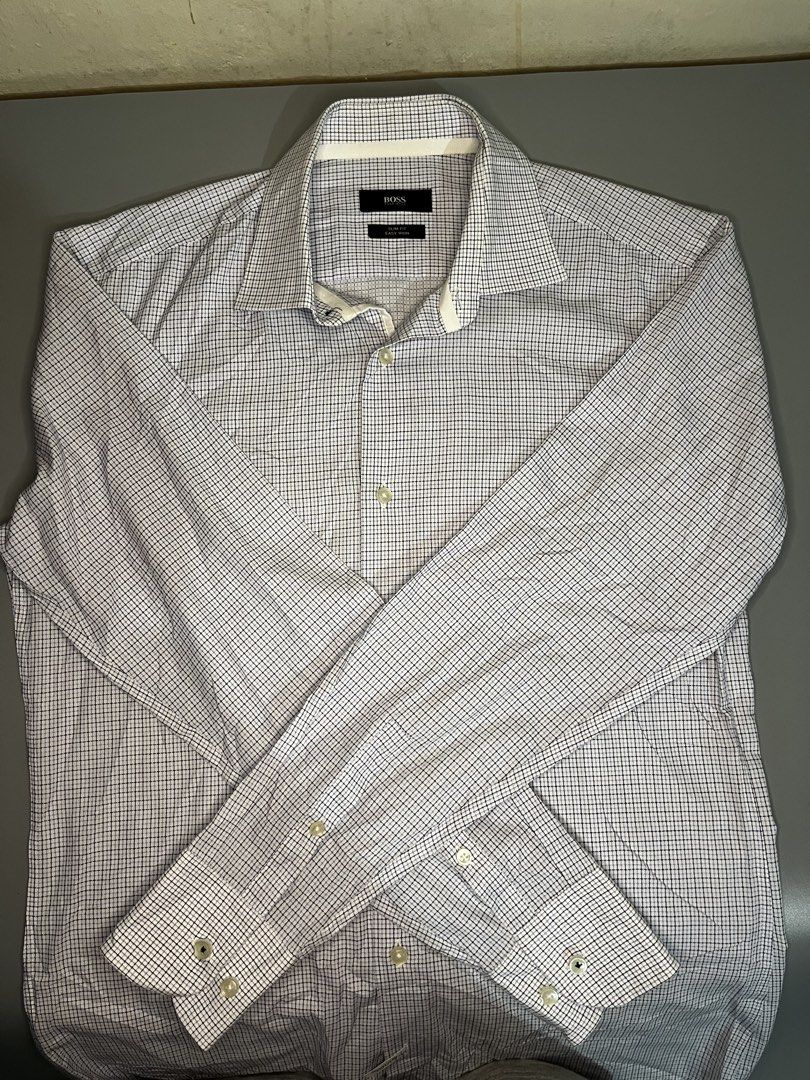 HUGO BOSS PLAIN LONGSLEEVE (Category: Formal Shirts) located in Calbayog City. Submitted by supremo02 (Listing ID 1463627054, Image 1). Description: HUGO BOSS PLAIN LONGSLEEVE Best fit Small to Medium 19.5x29 As new condition No issue.