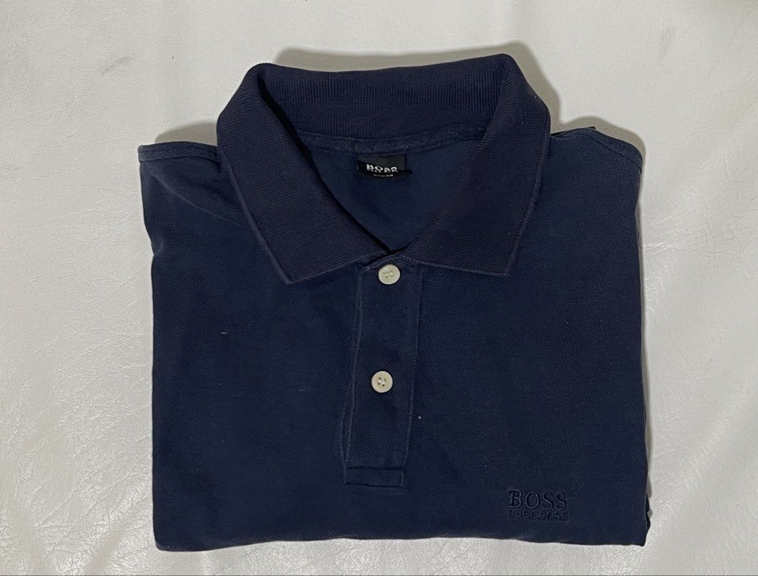 Hugo boss Polo shirt L (Category: Tshirts & Polo Shirts ) located in Marikina City. Submitted by joshuaades21107 (Listing ID 1463704906, Image 1). Description: Size large on tag 22 width 28 length Good condition 9/10 color rate and condition .