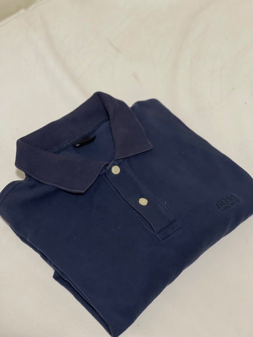 Hugo boss Polo shirt L (Category: Tshirts & Polo Shirts ) located in Marikina City. Submitted by joshuaades21107 (Listing ID 1463704906, Image 2). Description: Size large on tag 22 width 28 length Good condition 9/10 color rate and condition .