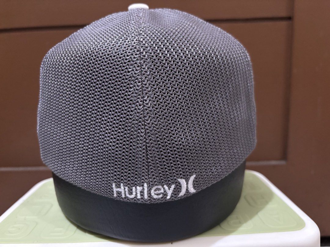 Hurley Trucker Cap S-M White Grey Flexfit (Category: Caps & Hats) located in Pasig City. Submitted by undone79 (Listing ID 1463597594, Image 2). Description: - Hurley trucker cap - White front with black logo - Grey mesh back - Flexfit S-M size - Made in Bangladesh - Ideal for sunny days or casual wear Payment first through GCash plus shipping fee Delivery through LBC,J&T, JRS,Lala Move,Joy Ride 09628470820 for inquiries.