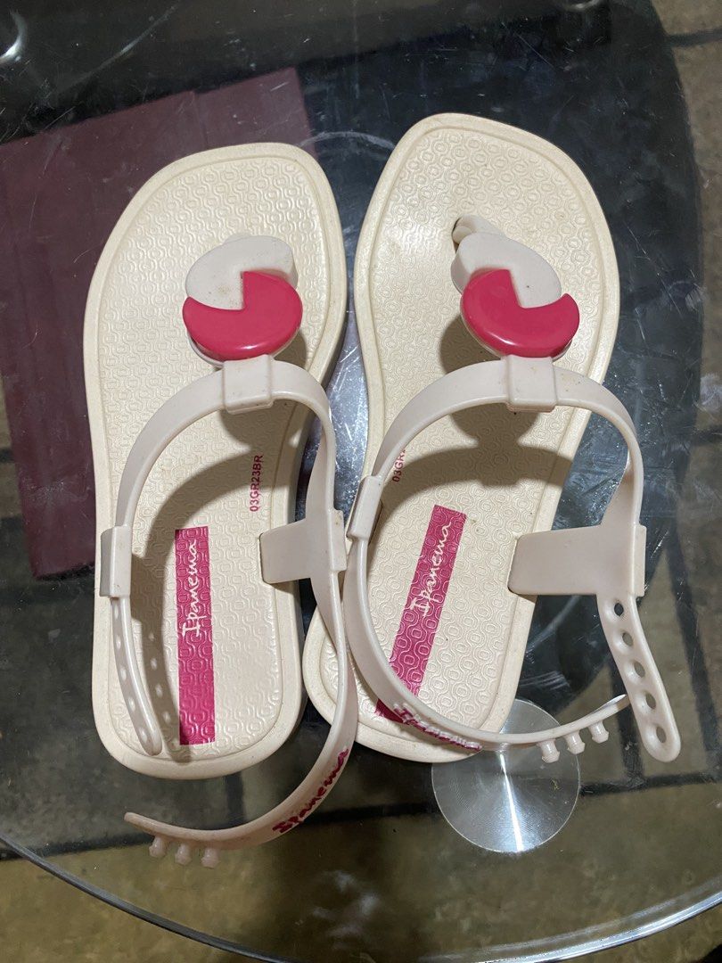 Ipanema Beige and Pink Flip-flops with Straps (Category: Babies & Kids Fashion) located in Quezon City. Submitted by maxenelove (Listing ID 1463652069, Image 1). Description: - Beige Ipanema flip-flops - Pink accent details - Adjustable ankle straps for a secure fit - Textured sole for grip - Ideal for beach days or casual outings - Easy to clean and maintain.