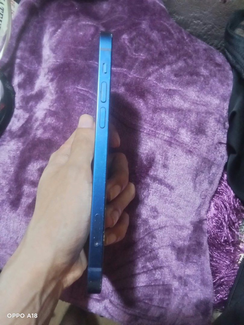 IPHONE 12 128GB 5G BLUE (Category: iPhone 12 Series) located in Taguig. Submitted by iphones.774 (Listing ID 1462939795, Image 2). Description: For sale!! Or Swap sa may add iPhone 12 BLUE 5G 🔵 128Gb NTC Variant🇵🇭 No sim restrictions Anysim Pwede Unli reset Face id working Truetone All working Working 0.5 sobrang linaw ang cam Pwede sa data pwede din sa wifi No repair history Battery Health 97% Orig battery never pa po napalitan Issue: medyo b