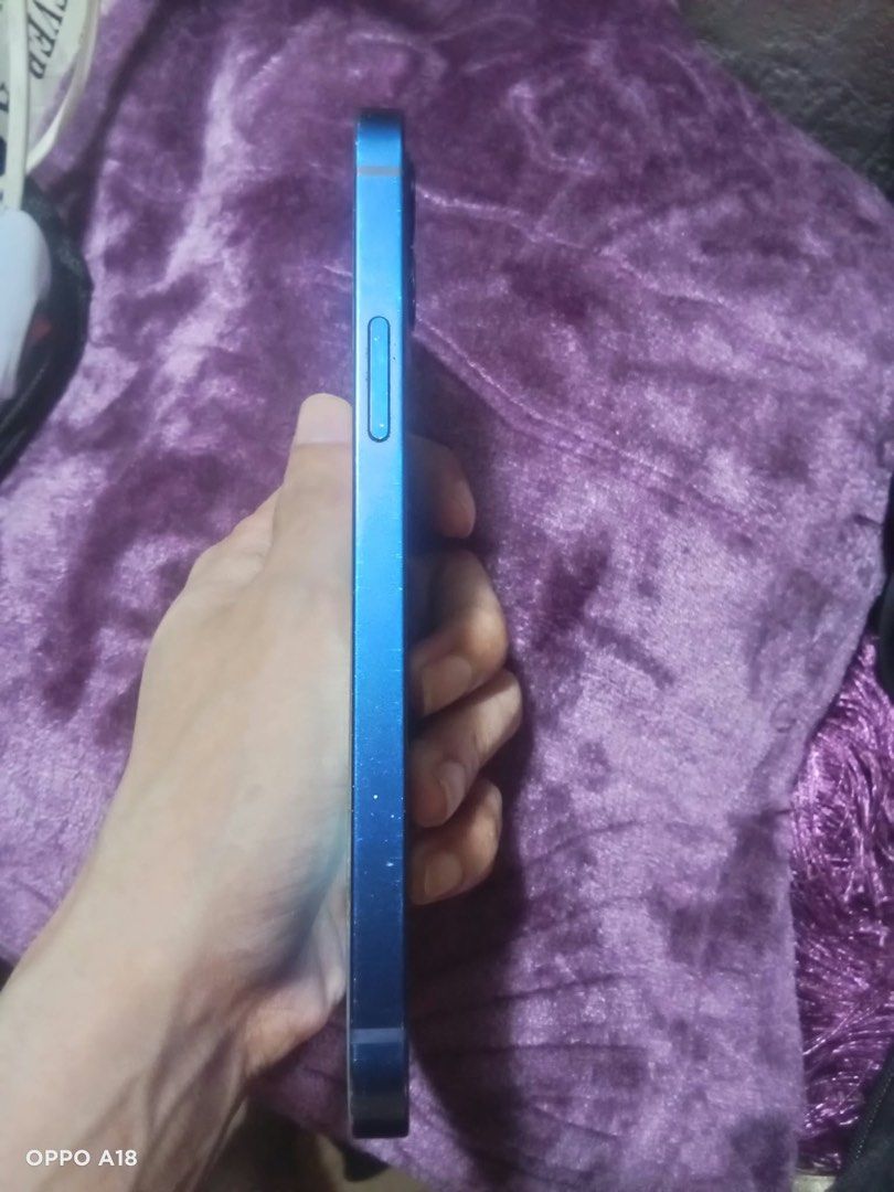 IPHONE 12 128GB 5G BLUE (Category: iPhone 12 Series) located in Taguig. Submitted by iphones.774 (Listing ID 1462939795, Image 3). Description: For sale!! Or Swap sa may add iPhone 12 BLUE 5G 🔵 128Gb NTC Variant🇵🇭 No sim restrictions Anysim Pwede Unli reset Face id working Truetone All working Working 0.5 sobrang linaw ang cam Pwede sa data pwede din sa wifi No repair history Battery Health 97% Orig battery never pa po napalitan Issue: medyo b