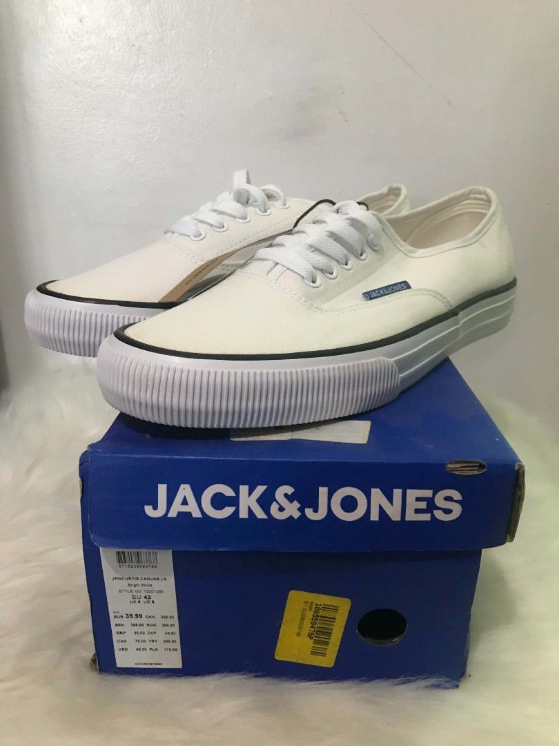 JACK & JONES White Canvas Sneakers (Category: Sneakers) located in Manila. Submitted by vincent.seller (Listing ID 1463616425, Image 3). Description: - Brand: JACK & JONES - Color: Classic White - Material: Canvas - Style: Lace-up sneakers - Condition: Brand new - Includes: Original box and tags - Perfect for: Casual wear, easy to pair with any outfit.