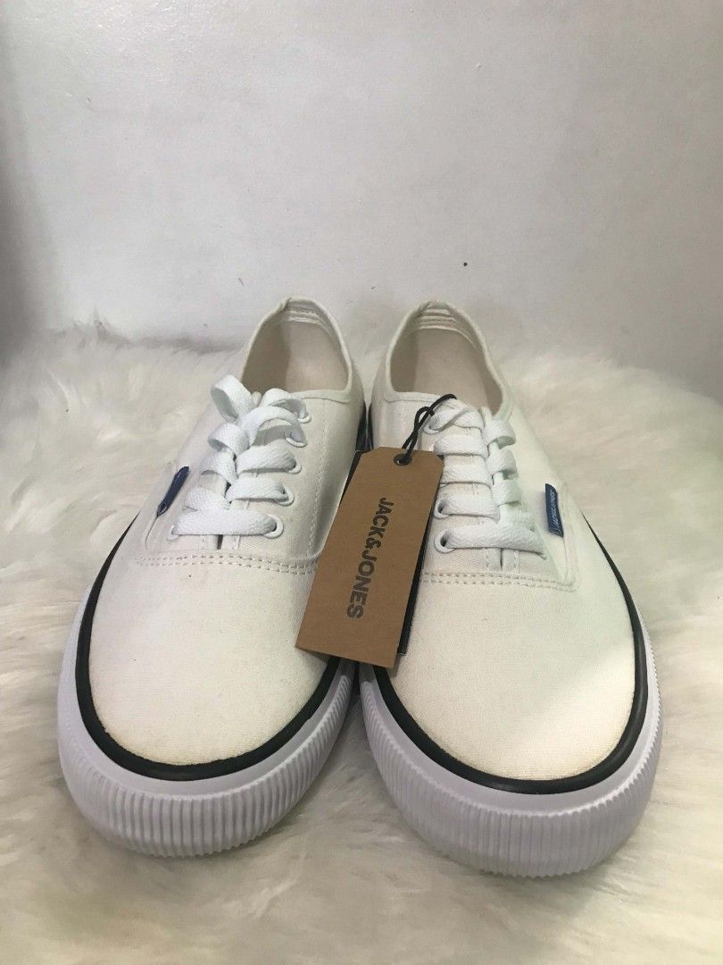 JACK & JONES White Canvas Sneakers (Category: Sneakers) located in Manila. Submitted by vincent.seller (Listing ID 1463616425, Image 1). Description: - Brand: JACK & JONES - Color: Classic White - Material: Canvas - Style: Lace-up sneakers - Condition: Brand new - Includes: Original box and tags - Perfect for: Casual wear, easy to pair with any outfit.