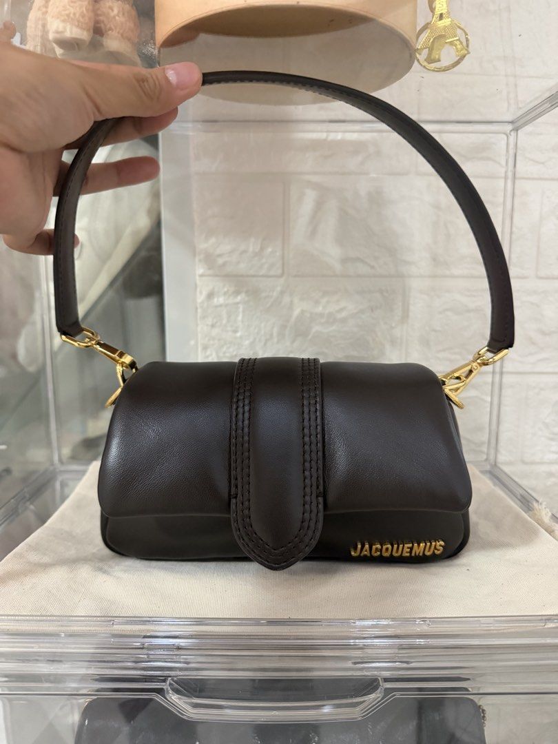 Jacquemus Le Petit Bambimou Brown bag (Category: Luxury Bags & Wallets) located in Cabanatuan. Submitted by justcram (Listing ID 1463659119, Image 1). Description: Super steal. Bought this for around 50k plus. Super hard to let go but sayang kasi if di magamit. Rfs: Not my style Price still negotiable - Guaranteed Authentic - Used only 3 or 4 times - Elegant gold hardware details - Includes original dust bag - Comes with its 2 straps (short and l