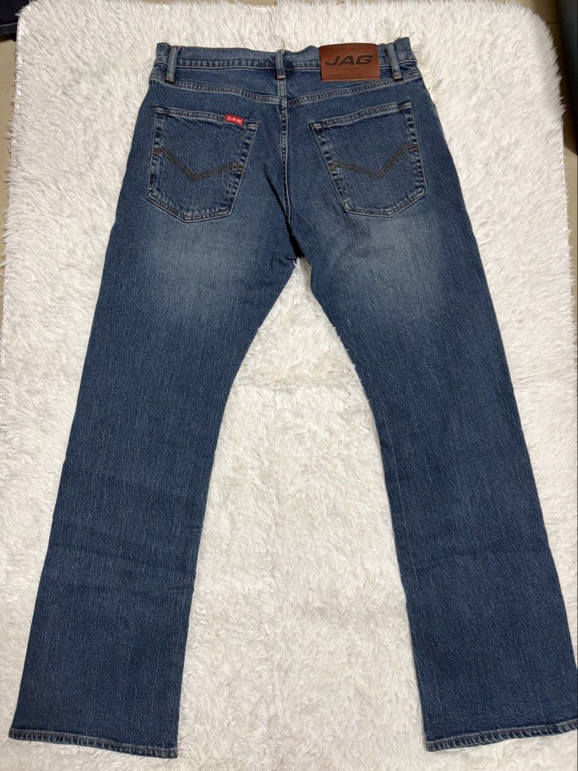 JAG Denim Jeans Size 31 (Category: Jeans) located in Quezon City. Submitted by Moms_closet (Listing ID 1463670231, Image 2). Description: - Classic blue JAG denim jeans - Straight leg cut - Made from 100% cotton - Button and zip closure - Two back pockets with signature stitching - Ideal for everyday wear - Measurements available upon request.