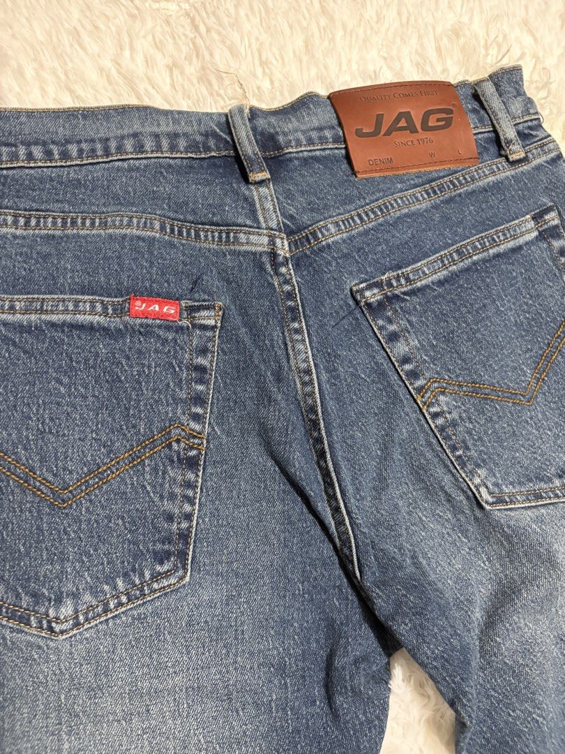 JAG Denim Jeans Size 31 (Category: Jeans) located in Quezon City. Submitted by Moms_closet (Listing ID 1463670231, Image 3). Description: - Classic blue JAG denim jeans - Straight leg cut - Made from 100% cotton - Button and zip closure - Two back pockets with signature stitching - Ideal for everyday wear - Measurements available upon request.