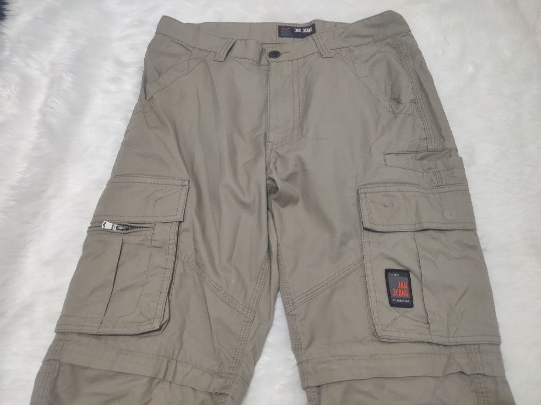 JAG JEANS Cargo Pants Khaki Size 29 (Category: Jeans) located in Tayug. Submitted by quennyscollection (Listing ID 1463560278, Image 3). Description: - Brand: Jag Jeans - Size: 29 - Style: Cargo Pants - Condition: Likenew - Color: Beige / Khaki Features: • 2-in-1 Design: Easily zips off from pants to shorts 🎛️ • Multiple deep functional cargo pockets for utility • Drawstring ankles for an adjustable straight or jogger fit • Durable gorpcore/stre
