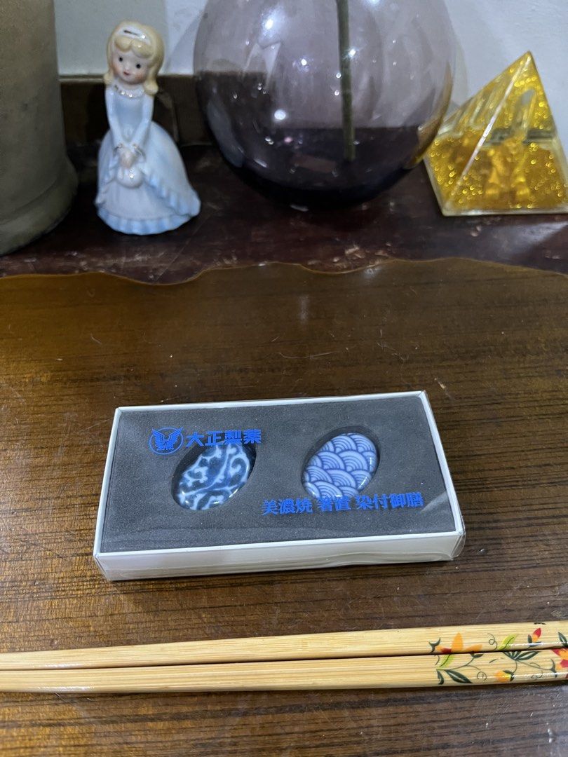Japanese Style Ceramic Chopstick Rests Set (Category: Dinnerware & Cutlery) located in Taguig. Submitted by minmin_parker (Listing ID 1463704551, Image 1). Description: - Set of 2 ceramic chopstick rests - Traditional Japanese blue and white patterns - Comes in a presentation box - Perfect for adding a decorative touch to your dining table - Great for sushi or any Asian cuisine.