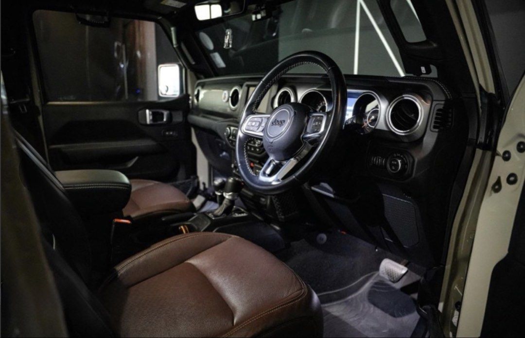 Jeep Gladiator Overland Auto (Category: Used Commercial Vehicles for Sale) located in Singapore. Submitted by lbbgroup (Listing ID 1463689523, Image 3). Description: *No consignment needed* Jeep Gladiator pickup truck. Dark grey exterior premium wrap . Brown leather interior. Spacious cabin with comfortable seating. Local drive with upgraded Falcon SP2.1 suspension. Full servicing done. Fully paid..