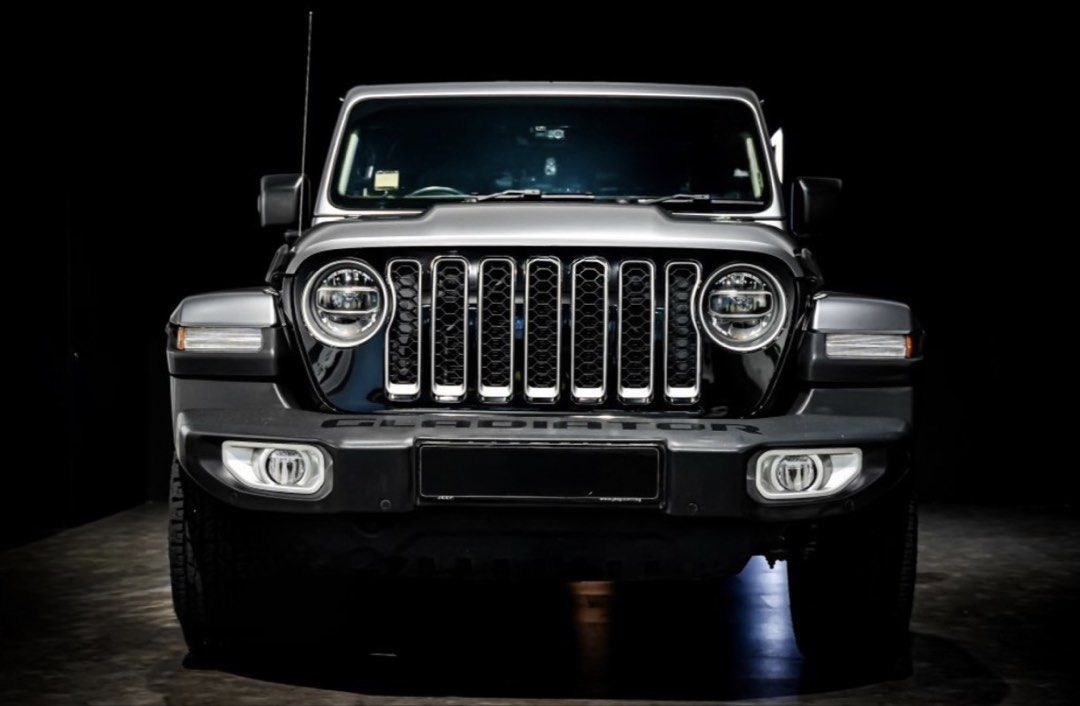 Jeep Gladiator Overland Auto (Category: Used Commercial Vehicles for Sale) located in Singapore. Submitted by lbbgroup (Listing ID 1463689523, Image 2). Description: *No consignment needed* Jeep Gladiator pickup truck. Dark grey exterior premium wrap . Brown leather interior. Spacious cabin with comfortable seating. Local drive with upgraded Falcon SP2.1 suspension. Full servicing done. Fully paid..