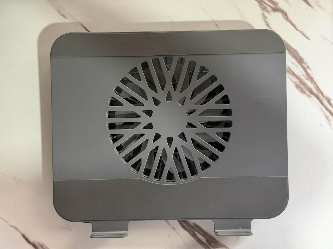 Jiditech 360° Rotating Bracket Laptop Stand with Fan (Category: Other Accessories) located in Silang. Submitted by eburi (Listing ID 1463621159, Image 1). Description: Jiditech 360° Rotating Bracket Laptop Stand with Fan - Magnetic detachable turbo fan - Silicone protection protects your machine Large area silicone pad - Dual devices on the same rack Free your desktop - Infinite rotation, adjust to where you want it - Can be used on laptops/table