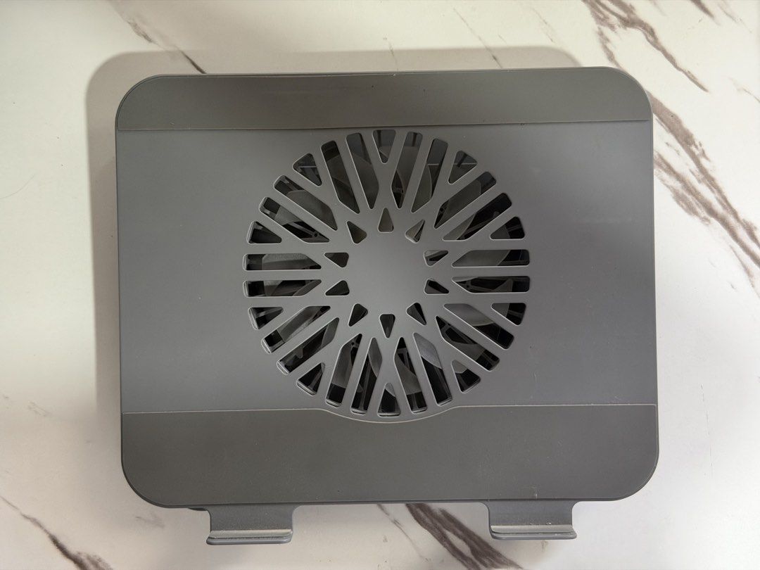 Jiditech Adjustable Laptop Stand with Cooling Fan (Category: Laptops & Notebooks) located in Silang. Submitted by honjinu (Listing ID 1463622254, Image 1). Description: Jiditech 3 IN 1 Laptop Stand With Fan - Used but not abused - Fan works excellently - Magnetic detachable turbo fan - Silicone protection protects your machine Large area silicone pad - Dual devices on the same rack Free your desktop - Infinite rotation, adjust to where you want i