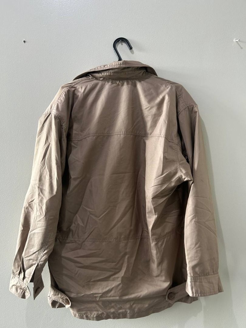 JL Brown Workwear Jacket (Category: Coats, Jackets and Outerwear) located in Taguig. Submitted by MoveQuickly (Listing ID 1463627185, Image 3). Description: - Classic beige jacket - Features plaid lining inside - Two front pockets - Button closure - Size: 32L x 20W - Note: Some discoloration on the collar area .