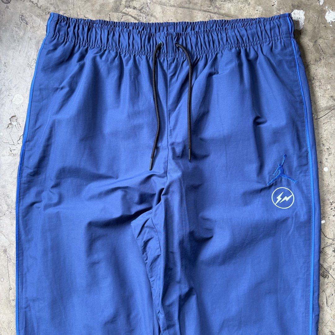 Jordan - Fragment - Nylon Ankle Zip Pants (Category: Trousers) located in Cavite. Submitted by 4118.ph (Listing ID 1463656968, Image 3). Description: Size XL / 34-38 9/10 condition Altered Waist 17.5” Length 38” Leg opening 6.5”.