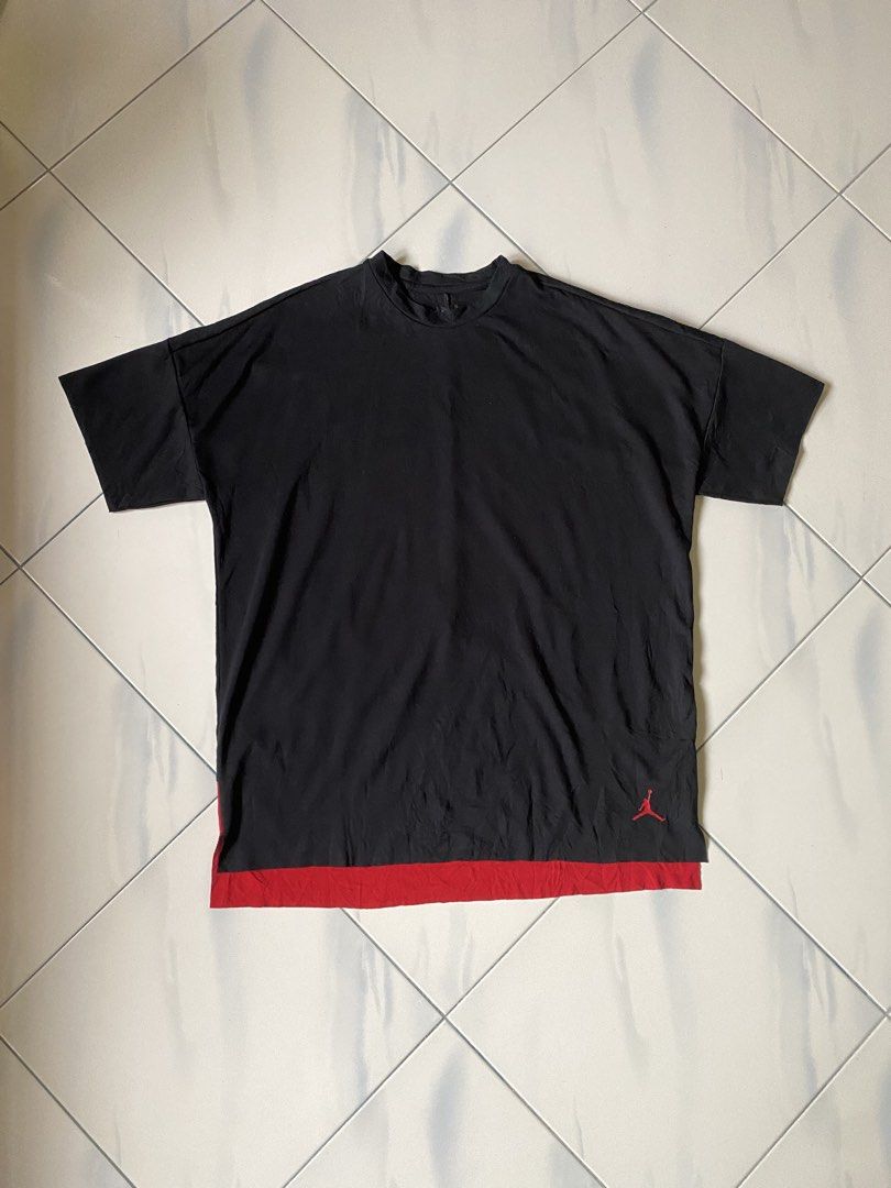 Jordan Brand T-Shirt Black Red Double Layer (Category: Tshirts & Polo Shirts ) located in Borongan. Submitted by cybutdiff (Listing ID 1463585487, Image 1). Description: - Authentic Black Jordan T-shirt - Size: XXL - Features a stylish red double layer hem - Iconic red Jumpman logo on the lower front - Perfect for casual everyday wear - Made in China.