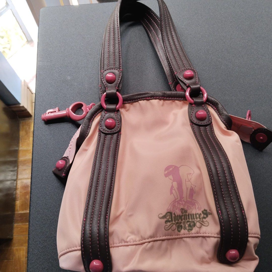 Juicy Couture (Category: Shoulder Bags) located in Quezon City. Submitted by marjoretz (Listing ID 1463570120, Image 3). Description: Vintage Juicy Couture “Her Majesty” Pink & Chocolate Brown Shoulder/ Tote Bag. Y2k-era collectible, nylon body with brown trim ,pink hardware and large Juicy Couture crest. Excellent vintage condition. Purchased in the USA.