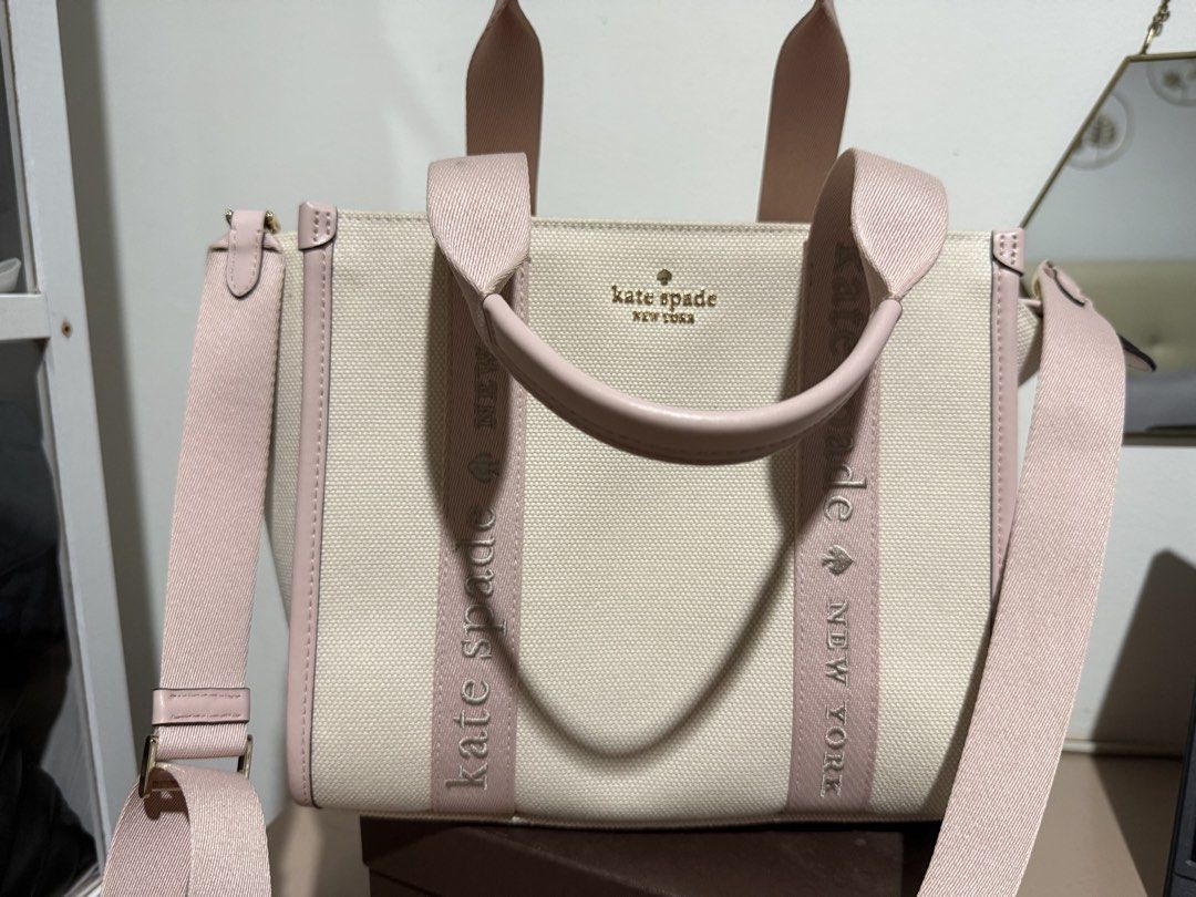 Kate Spade Kip Canvas Small Tote (Category: Tote Bags) located in Marilao. Submitted by archivesbysof (Listing ID 1463577989, Image 1). Description: Kate Spade Canvas Tote – Cream & Rose/Pink 🎀 Almost-new condition, barely used. Super pretty neutral/blush combination and very clean overall. • Barely used / almost new • No noticeable flaws • Clean canvas exterior • Spotless, clean interior • Handles and straps in excellent condition • Clean gold-