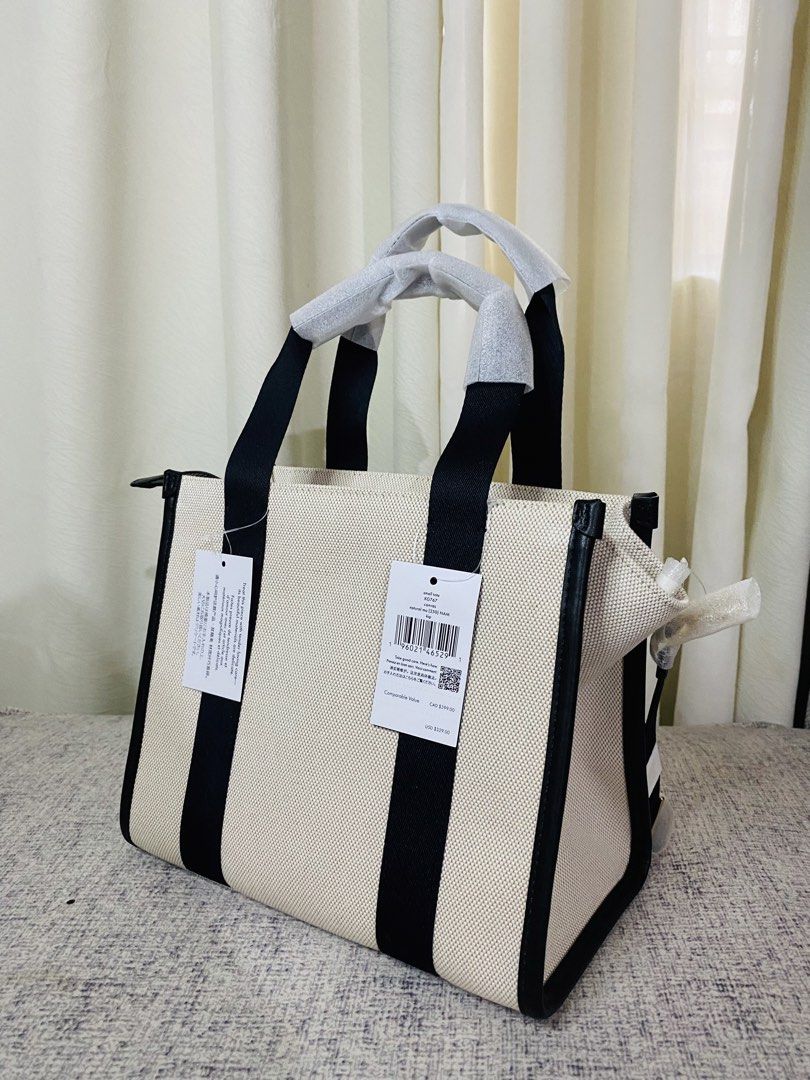 Kate spade Kip Canvas Small Tote (Category: Luxury Bags & Wallets) located in Manila. Submitted by glen_n (Listing ID 1463638811, Image 3). Description: Kate spade Kip Canvas Small Tote Brand New, Never Used, with Original Tag MEASUREMENT Length: 10.16” Height: 8.8” Width: 6.4” 100% Guaranteed Original Color: Natural Canvas with Black Details Bought from Canada Outlet 🇨🇦 A classic and elegant tote that’s perfect for everyday use! Spacious enoug