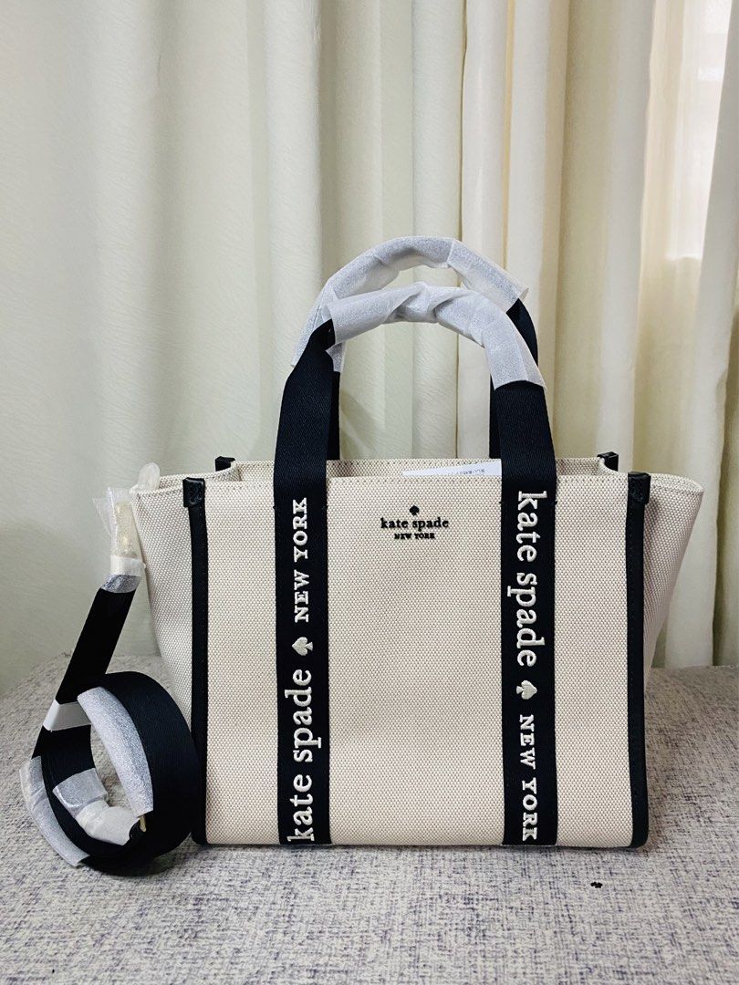 Kate spade Kip Canvas Small Tote (Category: Luxury Bags & Wallets) located in Manila. Submitted by glen_n (Listing ID 1463638811, Image 2). Description: Kate spade Kip Canvas Small Tote Brand New, Never Used, with Original Tag MEASUREMENT Length: 10.16” Height: 8.8” Width: 6.4” 100% Guaranteed Original Color: Natural Canvas with Black Details Bought from Canada Outlet 🇨🇦 A classic and elegant tote that’s perfect for everyday use! Spacious enoug