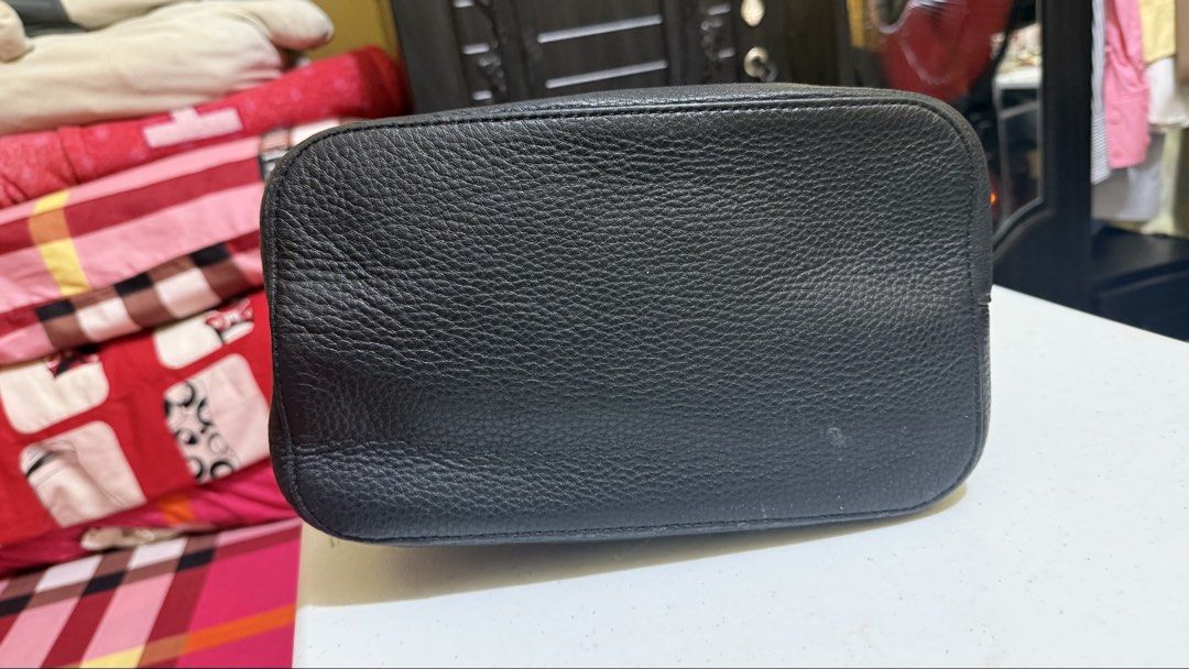 Kate Spade Marti (Category: Cross-body Bags) located in Quezon City. Submitted by callzona (Listing ID 1463588711, Image 3). Description: - Authentic Kate Spade New York bucket bag - Genuine black pebble leather - Elegant gold hardware details - Secure drawstring closure - Ideal for daily use.