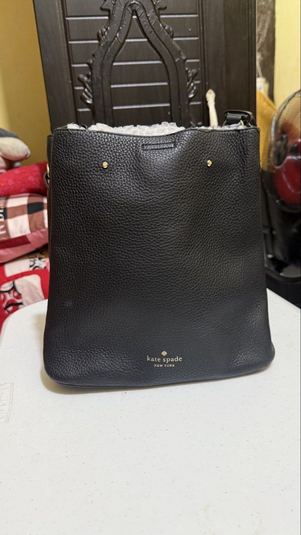 Kate Spade Marti (Category: Cross-body Bags) located in Quezon City. Submitted by callzona (Listing ID 1463588711, Image 2). Description: - Authentic Kate Spade New York bucket bag - Genuine black pebble leather - Elegant gold hardware details - Secure drawstring closure - Ideal for daily use.