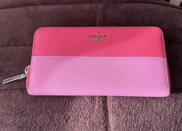 Kate Spade Pink Colorblock Zip Around Wallet (Category: Wallets & Card holders) located in Labrador. Submitted by bagwalletaccessoriesfromjapan (Listing ID 1463636179, Image 1). Description: ✨ AUTHENTIC KATE SPADE ZIP AROUND WALLET — TWO-TONE PINK ✨ Sweet and vibrant two-tone pink design! 🌸💖 Bright fuschia top + soft light pink bottom — fresh and feminine 💅 ✅ 100% Authentic Kate Spade New York ✅ Great condition — well kept! ✅ Saffiano leather 