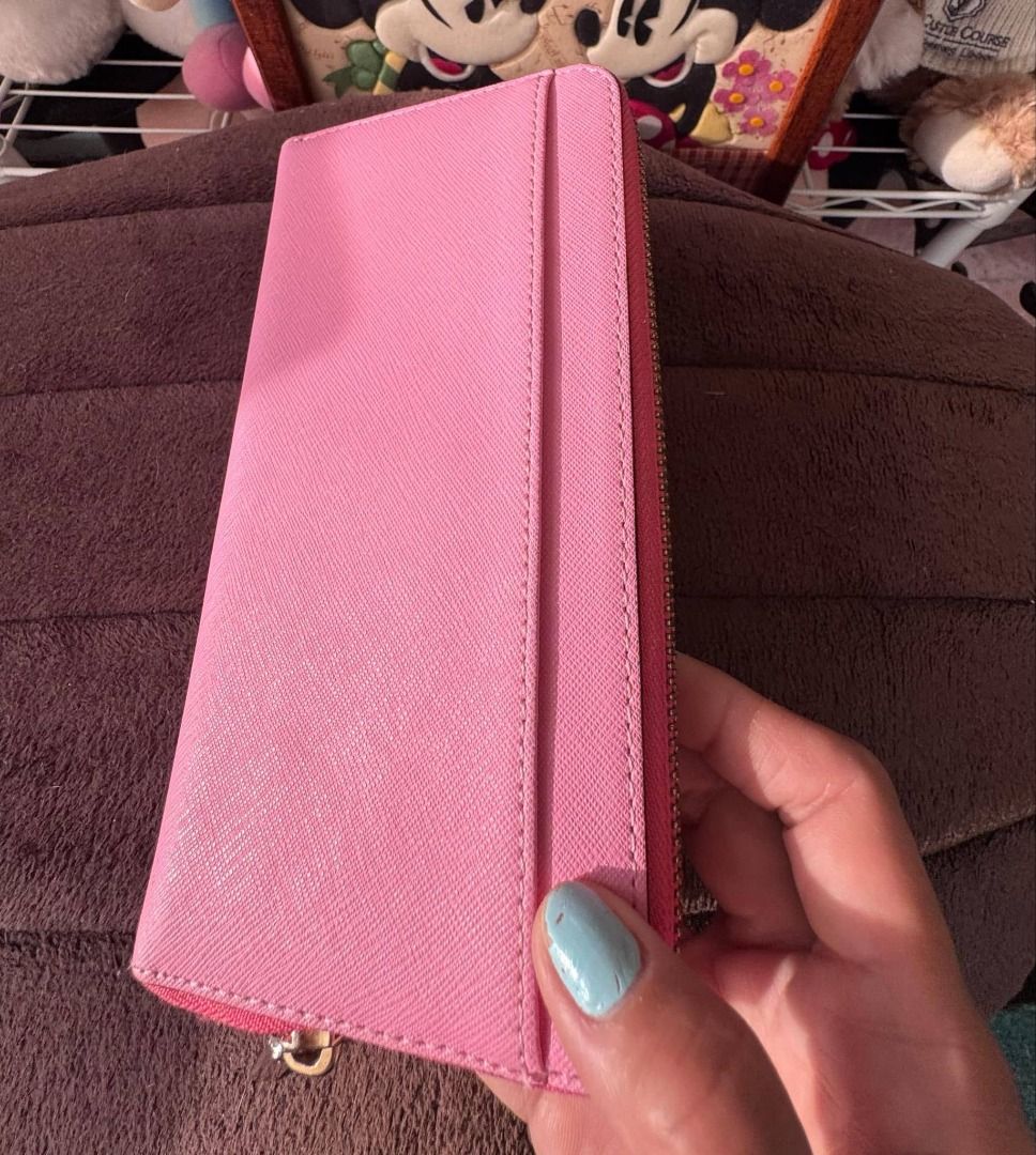 Kate Spade Pink Colorblock Zip Around Wallet (Category: Wallets & Card holders) located in Labrador. Submitted by bagwalletaccessoriesfromjapan (Listing ID 1463636179, Image 3). Description: ✨ AUTHENTIC KATE SPADE ZIP AROUND WALLET — TWO-TONE PINK ✨ Sweet and vibrant two-tone pink design! 🌸💖 Bright fuschia top + soft light pink bottom — fresh and feminine 💅 ✅ 100% Authentic Kate Spade New York ✅ Great condition — well kept! ✅ Saffiano leather 