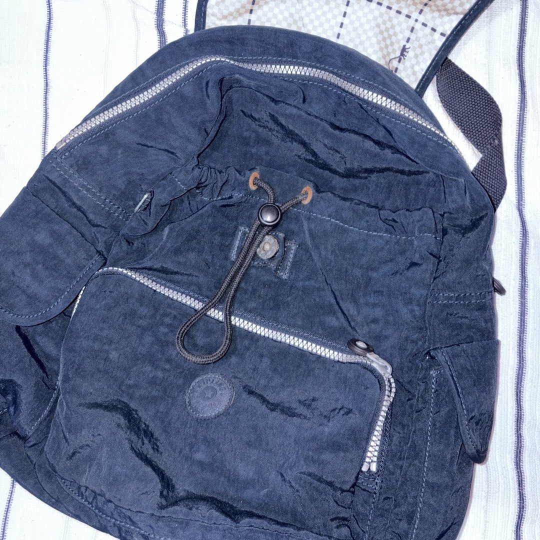 Kipling City Backpack Bag Pack (Navy Blue) (Category: Backpacks) located in Caloocan City. Submitted by lynaldeax (Listing ID 1463567754, Image 3). Description: Kipling City Backpack Navy blue - 2 side pockets - multiple pockets - Silver hardware - has some rust - see photos (needs cleaning) - Bought in Japan.