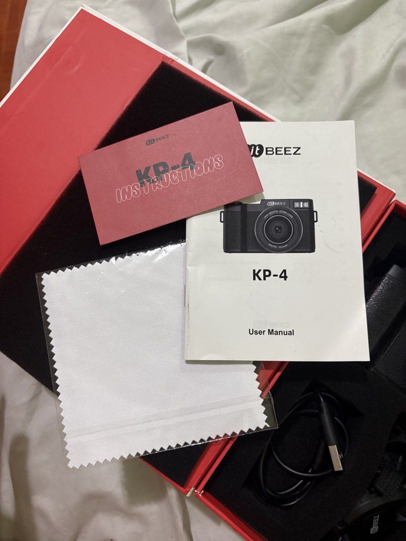 Kit Beez KP-4 Retro 5K UHD Digital Camera (Category: Cameras) located in Pasig City. Submitted by asia26_544 (Listing ID 1463598420, Image 2). Description: - Kit Beez KP-4 Retro Camera - Stunning 5K UHD imaging - 180° flip screen for easy selfies - Classic, stylish film-style body - Intelligent flash for perfect lighting - Compact and portable design - Includes a 32GB memory card - Your new bestie for capturing moments! Nabili namin nung december