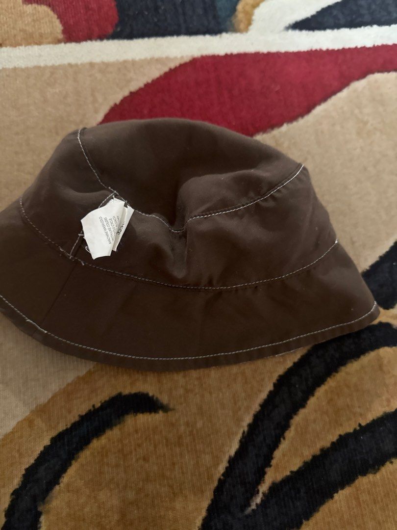 Koala Kids Bucket Hat 6-12 Months (Category: Babies & Kids Fashion) located in Quezon City. Submitted by thebubbly (Listing ID 1463628236, Image 2). Description: - Adorable bucket hat for babies - Reversible design: abstract print (brown/blue) on one side, plain brown on the other - Ideal for sun protection on sunny days - Fits babies aged 6-12 months.